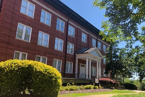 Exterior view of Hawkes Hall in summer